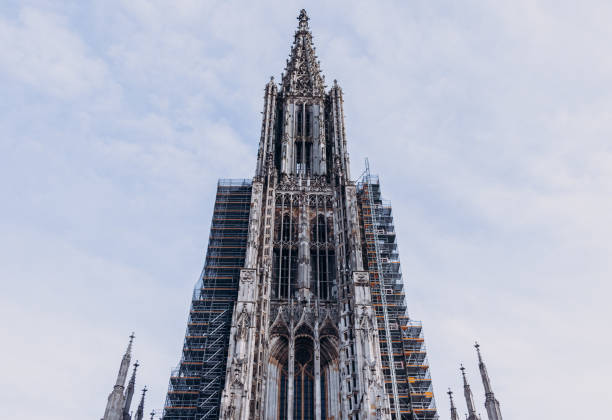 Ulm, Germany 02.01.2023: Ulmer Muenster - largest evangelical church. The tallest church towersteeple in the world. Ulm, Germany 02.01.2023: Ulmer Muenster - largest evangelical church. The tallest church towersteeple in the world. ulm minster stock pictures, royalty-free photos & images