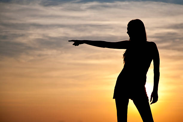 istock Woman silhoette pointing 148776137