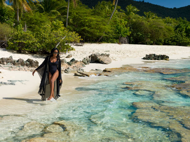 istock Woman with beach cover up 1487765477