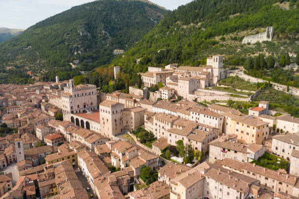 panoramic aerial view of the medieval town of gubbio umbria italy palace of the consuls panoramic aerial view of the medieval town of gubbio umbria italy palace of the consuls ancient arch architecture brick stock pictures, royalty-free photos & images