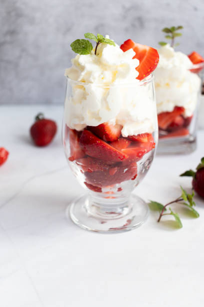 istock Dessert from whipped cream and fresh strawberries. 1487775675