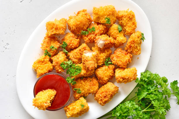 istock Homemade crispy fried chicken nuggets 1487776072
