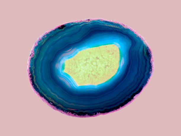 istock Backlight shotting of a agate crystal cross section with isolated on white background. 1487776606