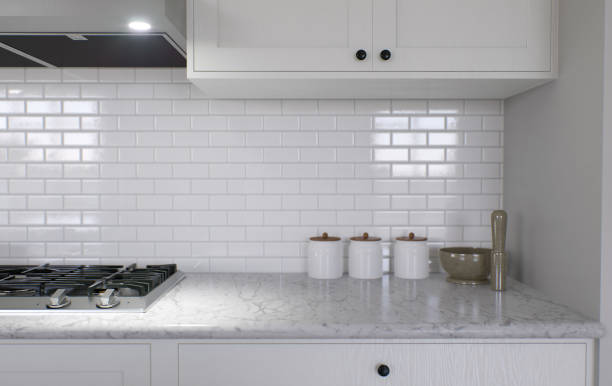 istock Large white kitchen with island and all necessary appliances. 3d rendering. Kitchen work area, with utensils. 1487779094