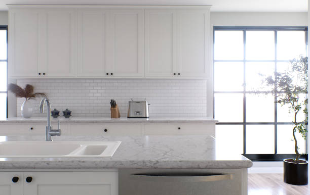 istock Large white kitchen with island and all necessary appliances. 3d rendering. The accent is on the stone top with white marble, the washer is located on the island. 1487779102