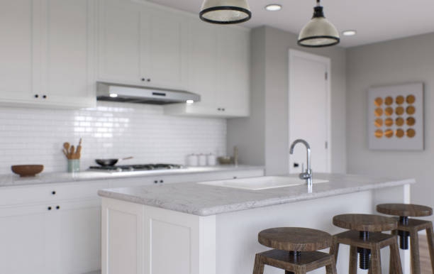 istock Large white kitchen with island and all necessary appliances. 3d rendering. Wooden bar stools, chandelier above the island, large tall cabinets. 1487779103