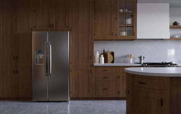 istock Spacious wooden kitchen with white marble. 3d rendering. A two-door chrome-plated refrigerator in the kitchen between the kitchen cabinets. 1487779135