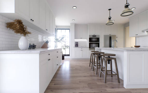 istock Large white kitchen with island and all necessary appliances. 3d rendering. Large spacious kitchen in bright colors and painted facades. 1487779136