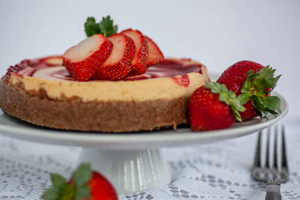 istock STRAWBERRY CHEESECAKE TOPPED WITH FRESH STRAWBERRIES 1487785449