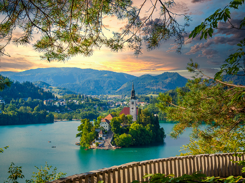 Amazing view of the Bled lake from the balcony. Slovenia famous landmark. Church on the island