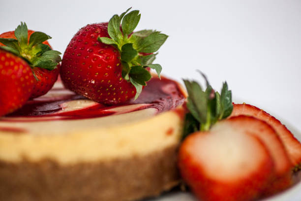 istock STRAWBERRY CHEESECAKE TOPPED WITH FRESH STRAWBERRIES 1487785672