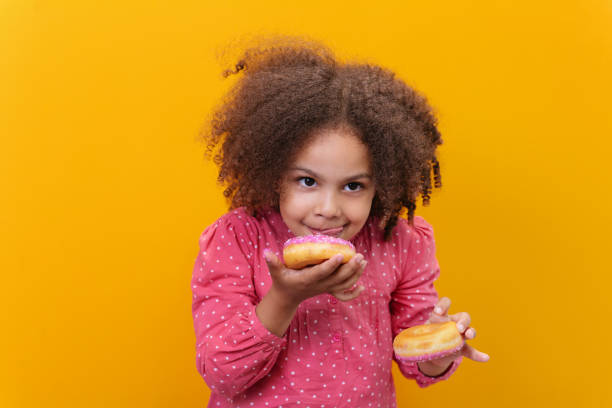 istock This donut makes her mouth water. So yummy. 1487786567