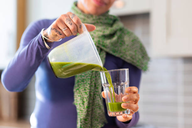 istock Pouring Raw Healthy vegitable Juice 1487787543