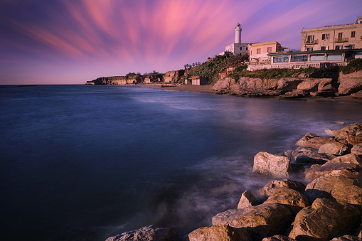 long exposure of the coast of anzio with the lighthouse
