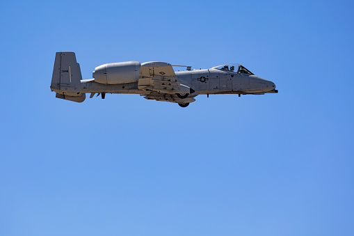 Tucson, Arizona, USA - March 25, 2023: An A-10 Thunderbolt II, also known as the Warthog or Tankbuster, in the air at the 2023 Thunder and Lightning Over Arizona airshow.