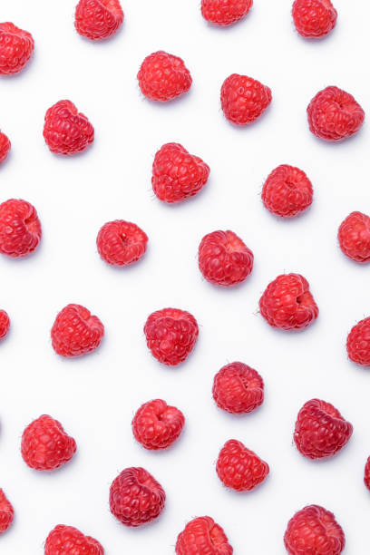 istock Raspberry background isolated fruits on a white background 1487798974