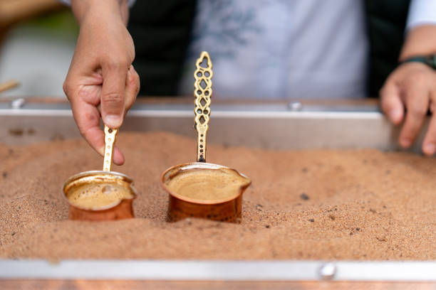 istock Turkish coffee cooking in sand 1487800177
