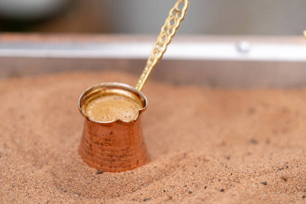 Turkish coffee cooking in sand