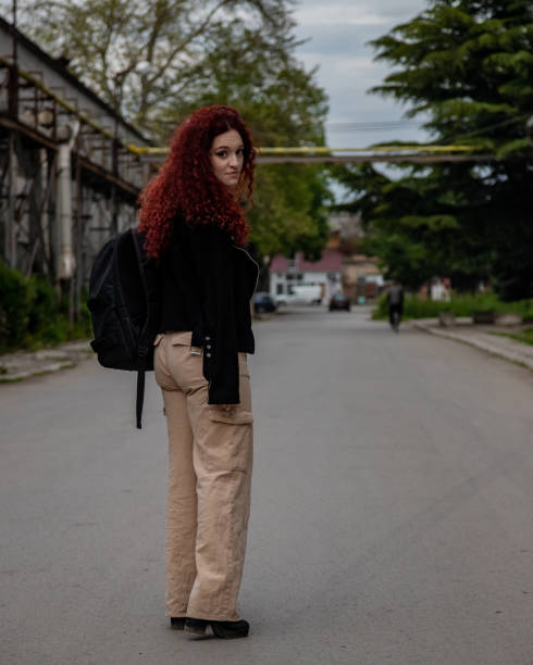 istock Young woman in abandoned factory 1487805155