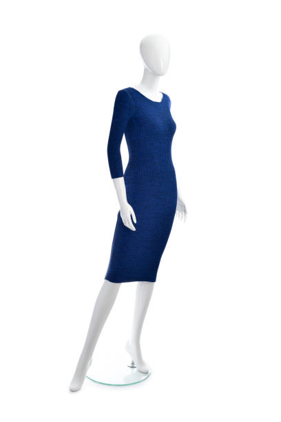 istock Mannequin dressed in black dress isolated on white background 1487806236