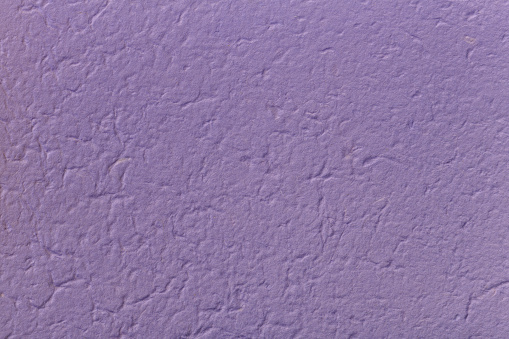 Lilac colored textured wrapping paper background