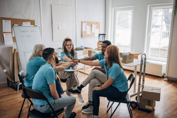 istock Volunteers in charity center 1487806862