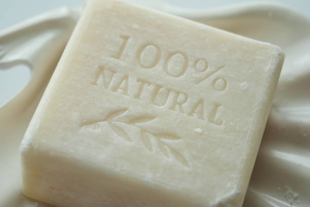 istock Homemade natural soap bar on black background 1487807729