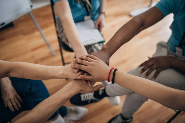 istock Volunteers in charity center 1487807766