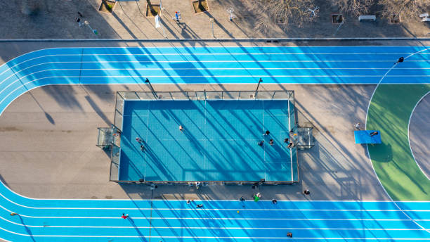 istock Training court with running track aerial view 1487807977