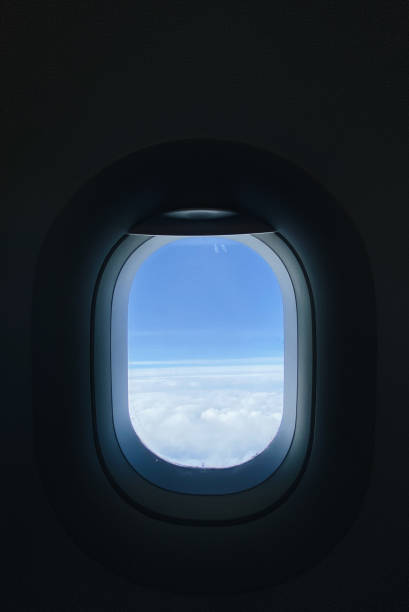 istock View of clouds through airplane window 1487809395