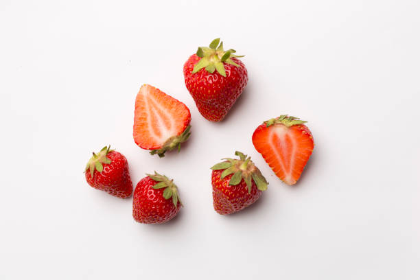 istock Fresh strawberries on white background, top view 1487810537