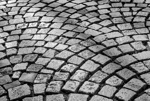 Utrecht, Netherlands - April 2, 2023: Close up detail of the patterns in cobble stone streets in old town Utrecht