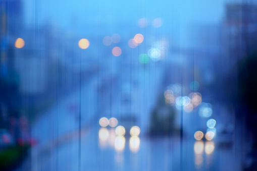 Blurry background image of defocused abstract city street lights at night
