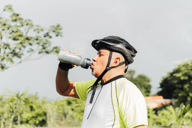 istock Fitness man drinking water from a bottle 1487816416