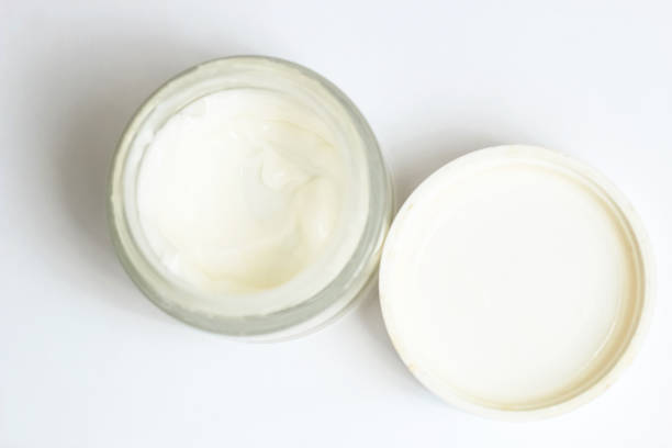 istock Moisturizing spf cream in a jar on a light background 1487817181