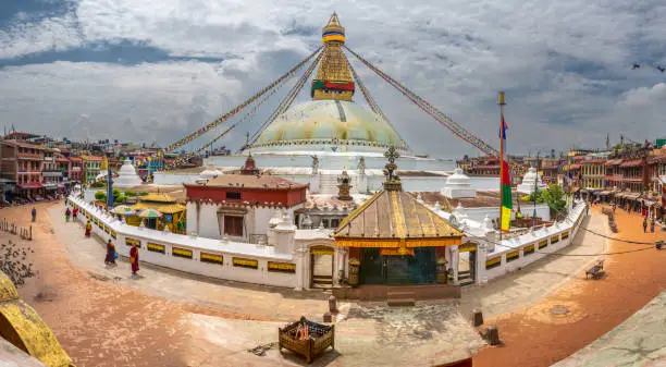 Photo of This whitewash dome and gilded tower is one of the most important location for the buddhist religion in Nepal, Boudhanath Stupa, Kathmandu, Nepal