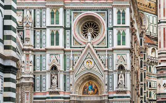 Details of the exterior of the Cattedrale di Santa Maria del Fiore (Cathedral of Saint Mary of the Flower) - the main church of Florence, Tuscany, Italy. Close-up with details