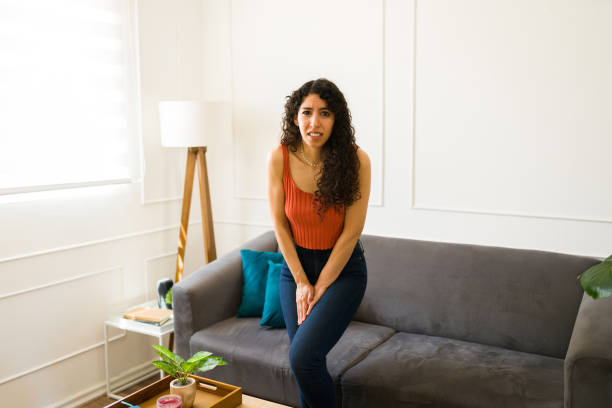 istock Upset young woman with health and urinary incontinence problems 1487828420