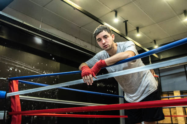 istock Portrait a young boxer after training in the ring 1487831817