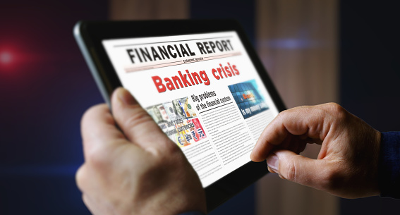 Banking crisis economy finance and global recession daily newspaper reading on mobile tablet computer screen. Man touch screen with headlines news abstract concept 3d illustration.