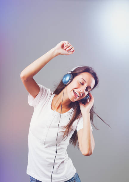 istock Dazzling lights, dance, young lady 1487834640