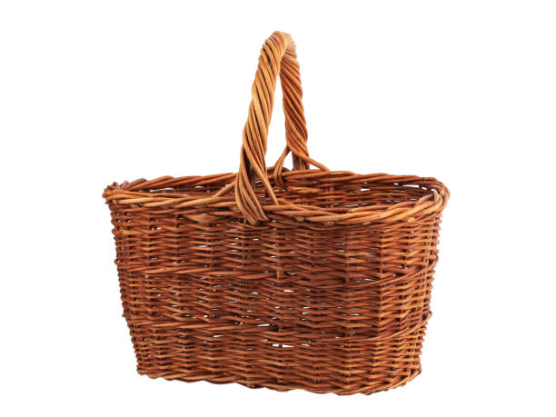 istock wicker basket for berries made of willow twigs, isolate on a white background 1487835456