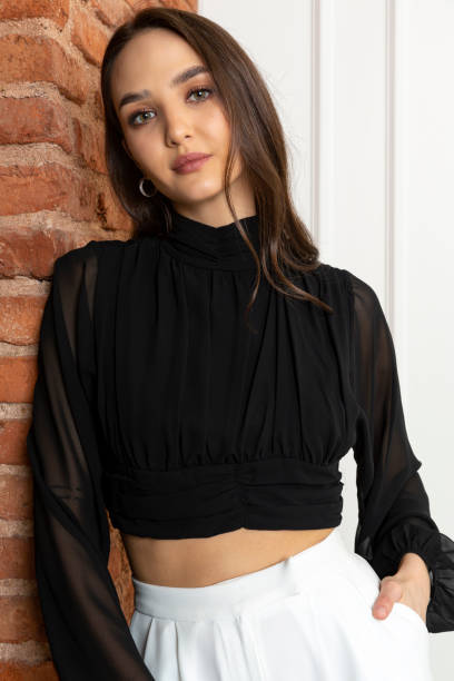 istock Beautiful brunette model wearing stylish outfit. 1487835608
