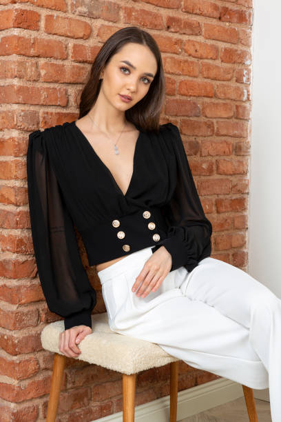 istock Beautiful brunette model wearing stylish outfit. 1487835698