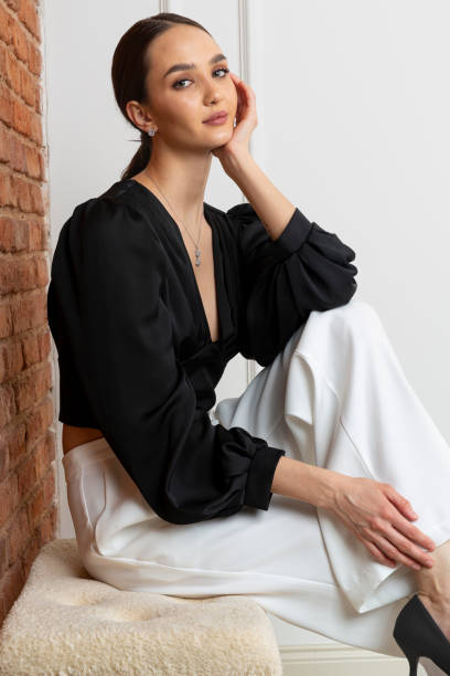 istock Beautiful brunette model wearing stylish outfit. 1487835710