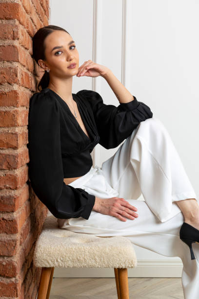 istock Beautiful brunette model wearing stylish outfit. 1487835722