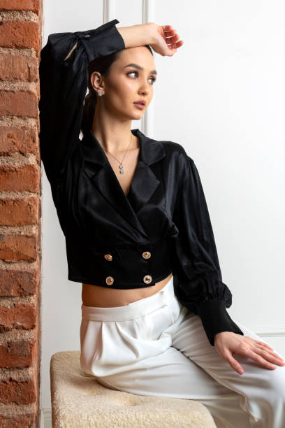istock Beautiful brunette model wearing stylish outfit. 1487835760