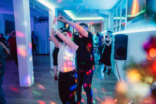 istock Couple dancing salsa at the party 1487837923