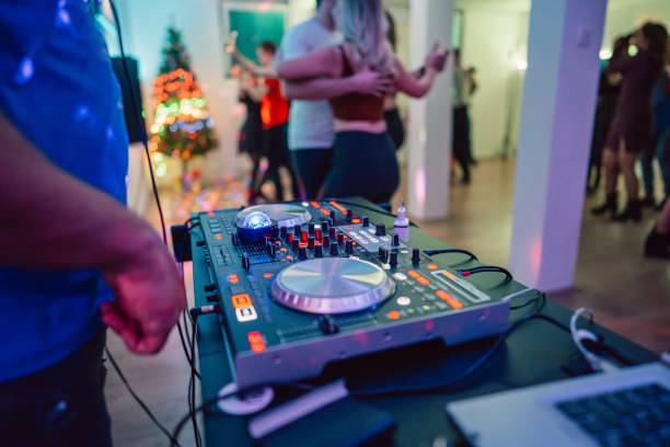 istock DJ playing music at a party indoors 1487837994