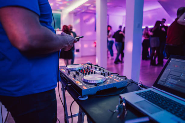 istock DJ playing music at a party indoors 1487838010